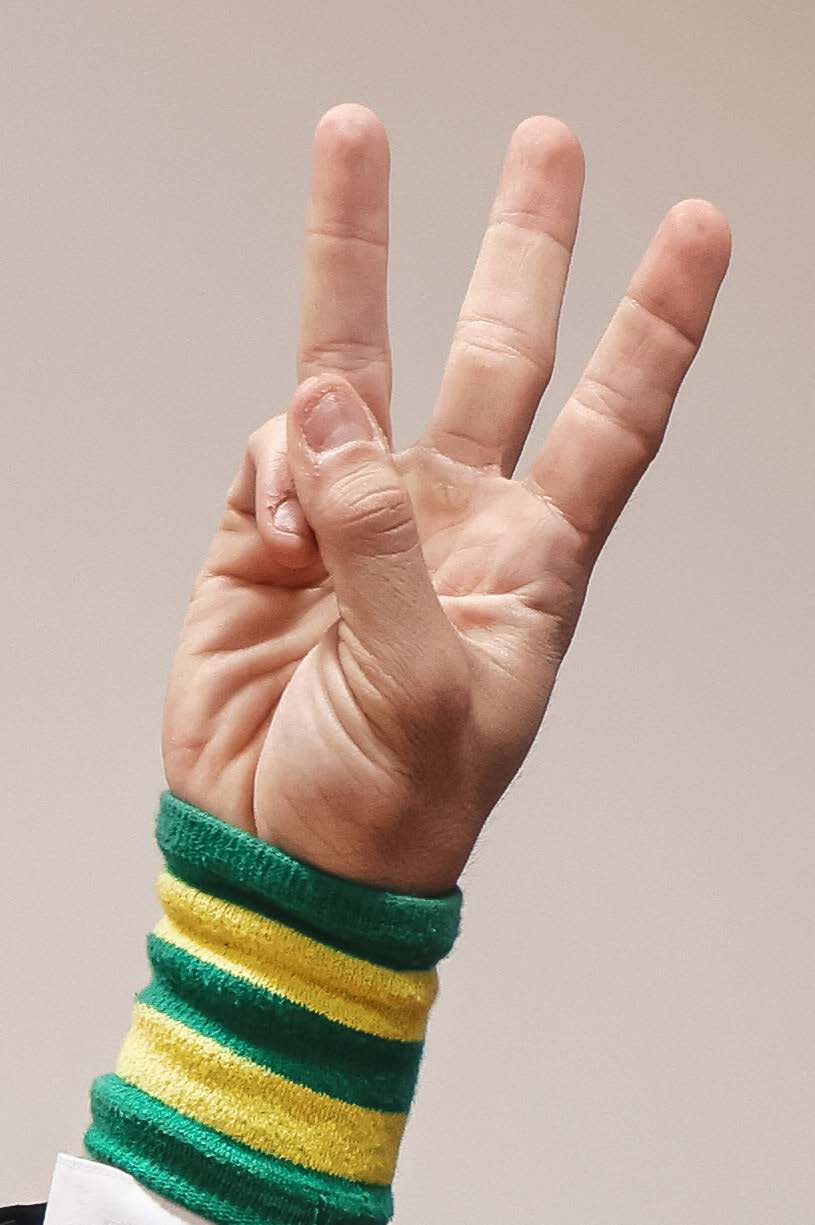 Referee signal for 4 points close-up - four fingers extended