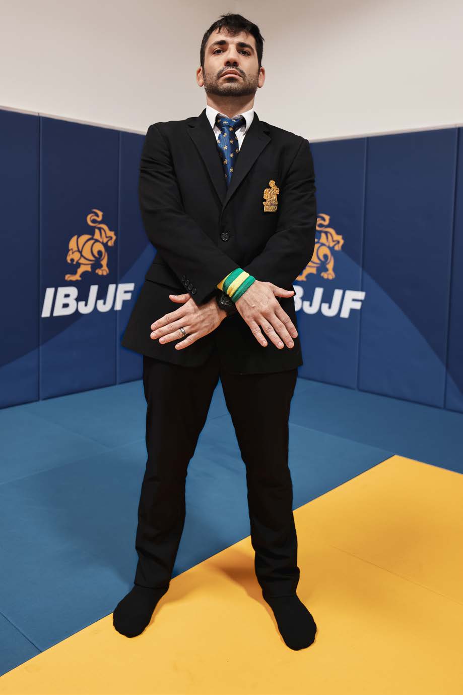 Referee signal for match result - winning athlete's arm raised