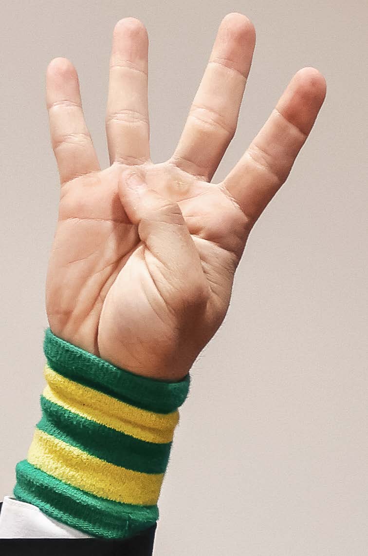 Referee signal for point deduction - arm at shoulder height with palm open