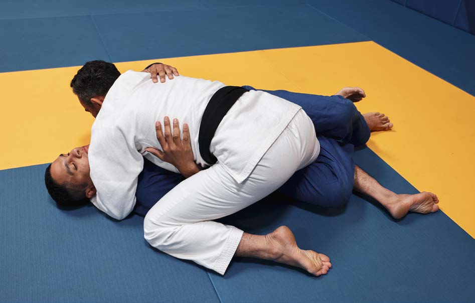 Mount - typical mount position sitting on opponent's torso