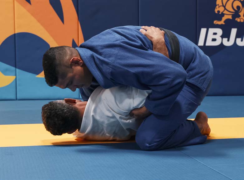 Sweep from back - position stabilized with knee on ground